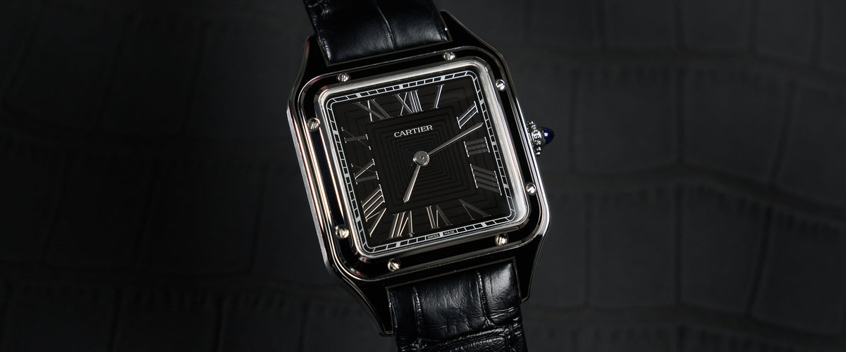 Cartier Santos-Dumont on a dark surface